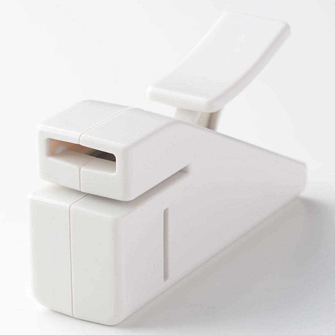Stapleless Stapler White