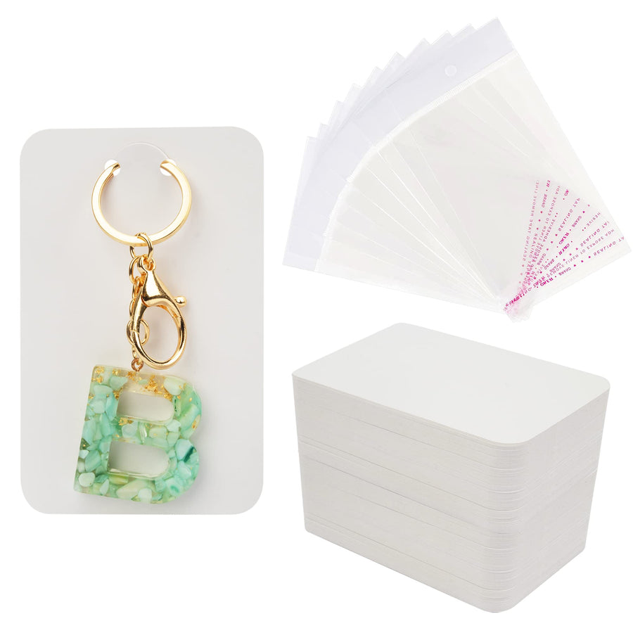 100 Pcs Keychain Display Cards with Self-Sealing Bags, 3'' x 4.7'' Keychain Cards Holder for Display Keyring Cards Jewelry Packaging Supplies (White)
