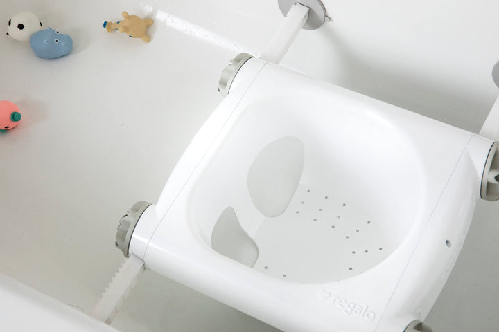 Baby Basics™ Bath Seat, Award Winning Brand, Provides Support and Balance for Sit-Up Bathing, Includes Strong and Secure Suction Cup System, Drain Holes for Easy Clean Up, 0560 DS, White