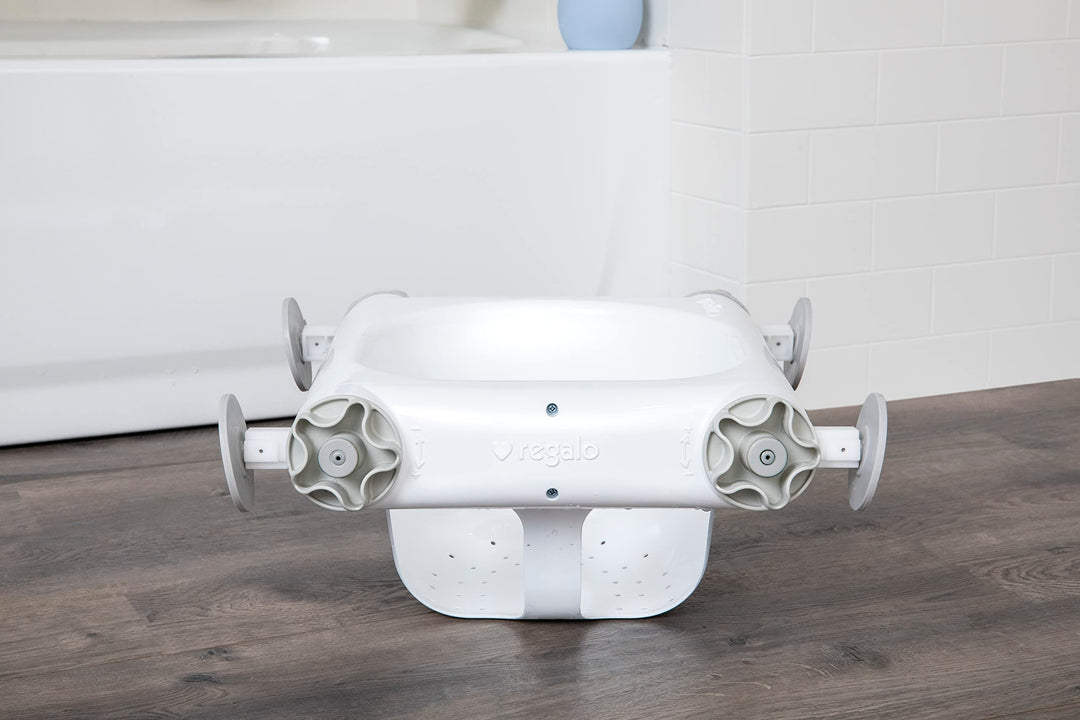 Baby Basics™ Bath Seat, Award Winning Brand, Provides Support and Balance for Sit-Up Bathing, Includes Strong and Secure Suction Cup System, Drain Holes for Easy Clean Up, 0560 DS, White