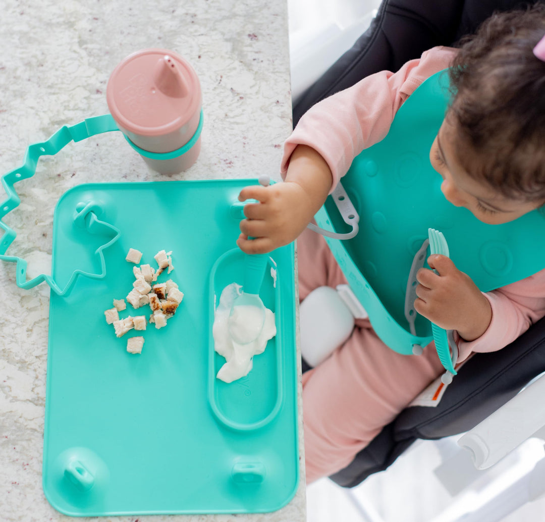 Silicone Mat - Suction Cups, 4 Straps to Secure Baby Essentials, Self Feeding, Baby Led Weaning, Travel Sleeve Included (Spearmint)