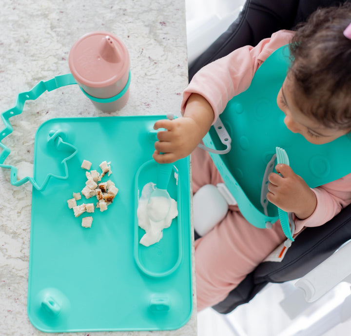 Silicone Mat - Suction Cups, 4 Straps to Secure Baby Essentials, Self Feeding, Baby Led Weaning, Travel Sleeve Included (Spearmint)