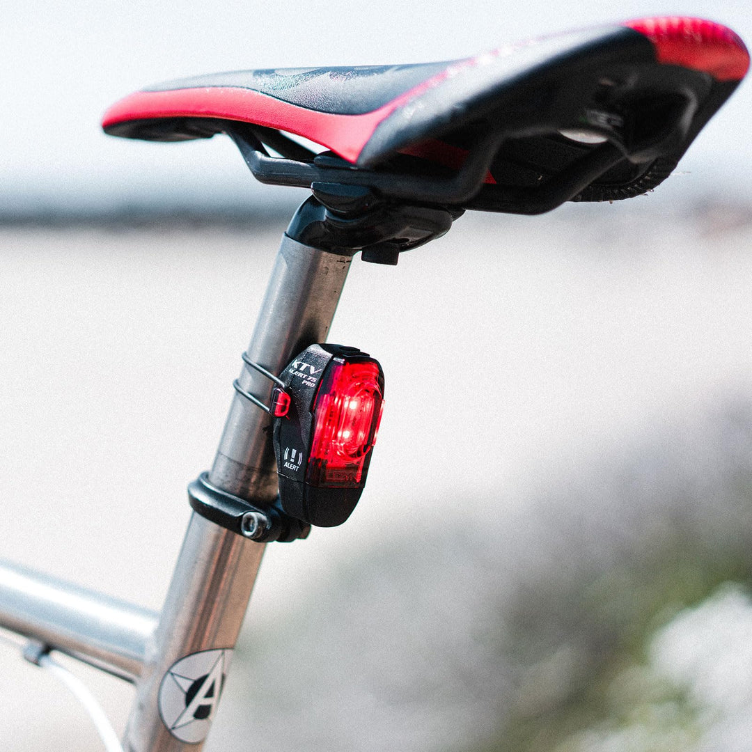 KTV Drive Pro Alert Rear - Bicycle USB Rechargeable Durable Weather-Resistant IPX7 White LED Tail Light with 2 Solid & 3 Flash Modes | Includes Silicone Rubber Mounting Strap | 75 Lumens