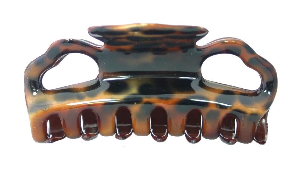 Rounded Teeth Hearty Opening Design Hair Claw With An Animal Print Design