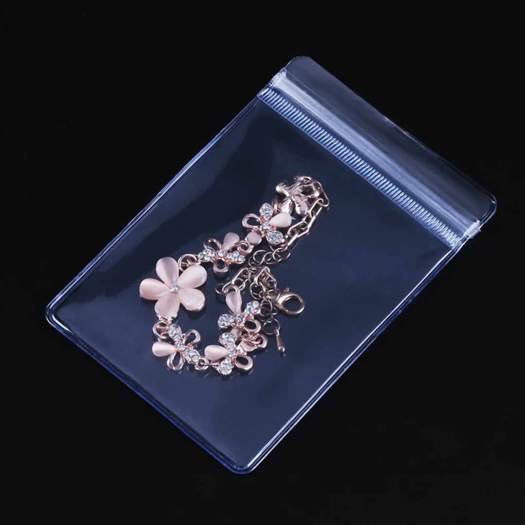 Antitarnish Jewelry Rings Earrings Packing Storage Pouch 100 PCS PVC Clear Jewelry Anti Oxidation Zipper Bags 2 x 2.8 INCH Transparent Jewellery Pouch Thick Airtight Storage Sack