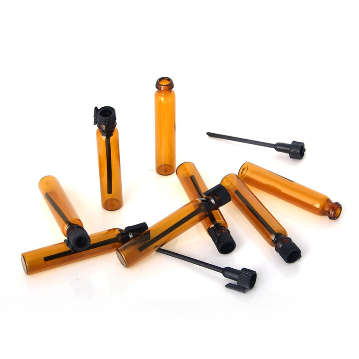 100Pieces Amber Glass Mini Small Empty Perfume Sample Bottles Travel Refillable Aromatherapy Essential Oils Liquid Fragrance Sample Vials With Black Caps (1ml)