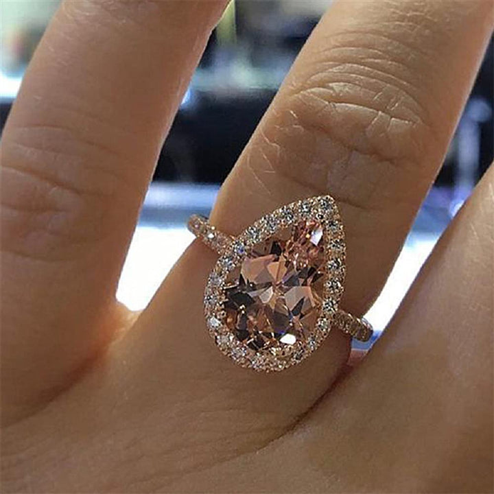 Weishu Women&#39;s 925 Sterling Silver pear Cut 5ct Pink Cubic Zirconia Ring Cocktail Engagement Wedding Ring Promise Aura Single Stone Engagement Ring (US Code 8)