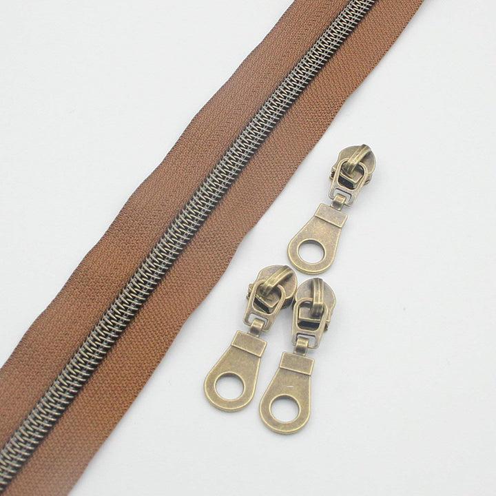 #5 Antique Brass Metallic Nylon Coil Zippers by The Yard Bulk 10 Yards (Brown Tape with 25pcs Brass Sliders for DIY Sewing Tailor Craft Bag(Brown)