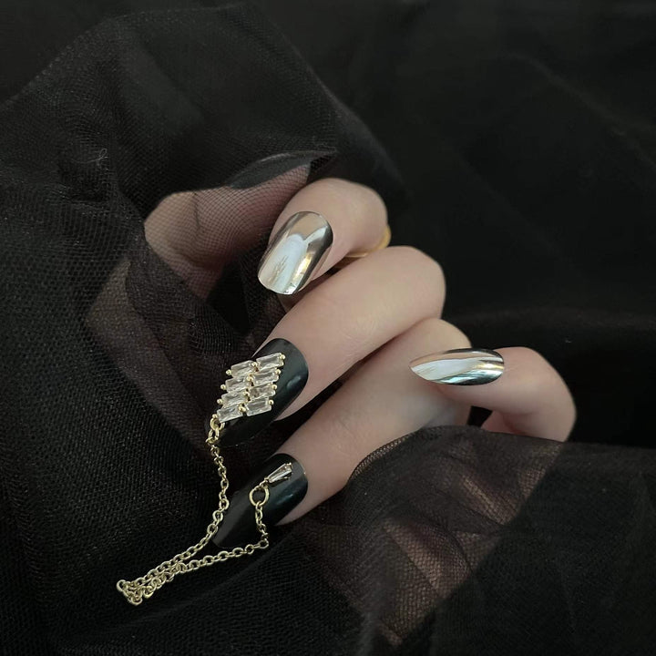 24 Pcs Press on Nails Medium Length,Mirror Fake Nails,Black Gold False Nails with Chain for Women and Girls
