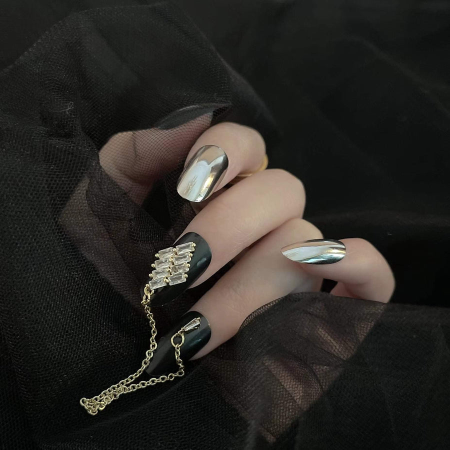 24 Pcs Press on Nails Medium Length,Mirror Fake Nails,Black Gold False Nails with Chain for Women and Girls