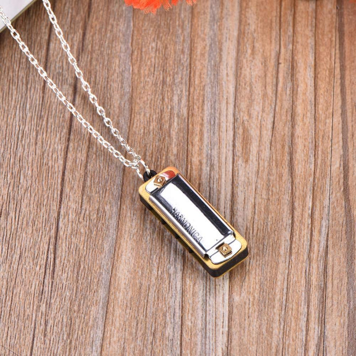 Mini Harmonica, Portable C 4 Holes 8 Tones Harmonica Mouth Organ with Necklace Key for Kids Kids Adults(Silver)