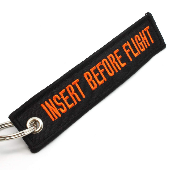 Insert Before Flight Keychain - Black/Orange
