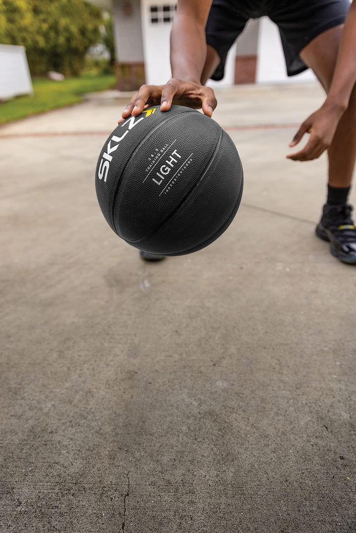 Lightweight Control Basketball Trainer for Improved Dribbling