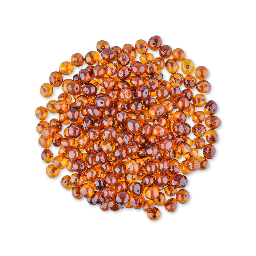 - Loose Polished Amber Beads from The Baltic Sea - Drilled Through - 10 Grams - 4-6 mm - Cognac