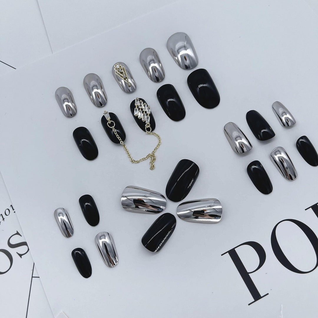 24 Pcs Press on Nails Medium Length,Mirror Fake Nails,Black Gold False Nails with Chain for Women and Girls